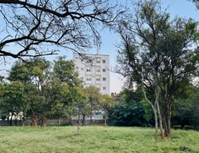 Truelife Whitefield - Premium 1 BHK Apartments - Prime location - Easy access to Main Rd - Metro - ITPL - Fast WiFi - Kitchen - Smart TV - Power backup - Park - Garden views
